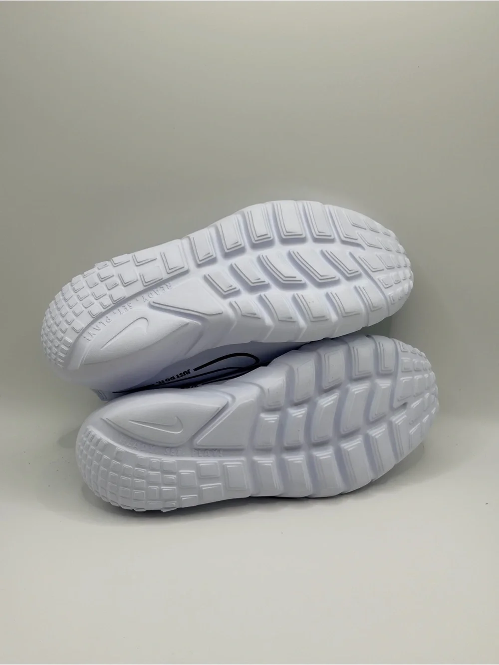 Nike 6Y/7.5W Light Blue and White Slip-On Sneakers with Navy Swoosh